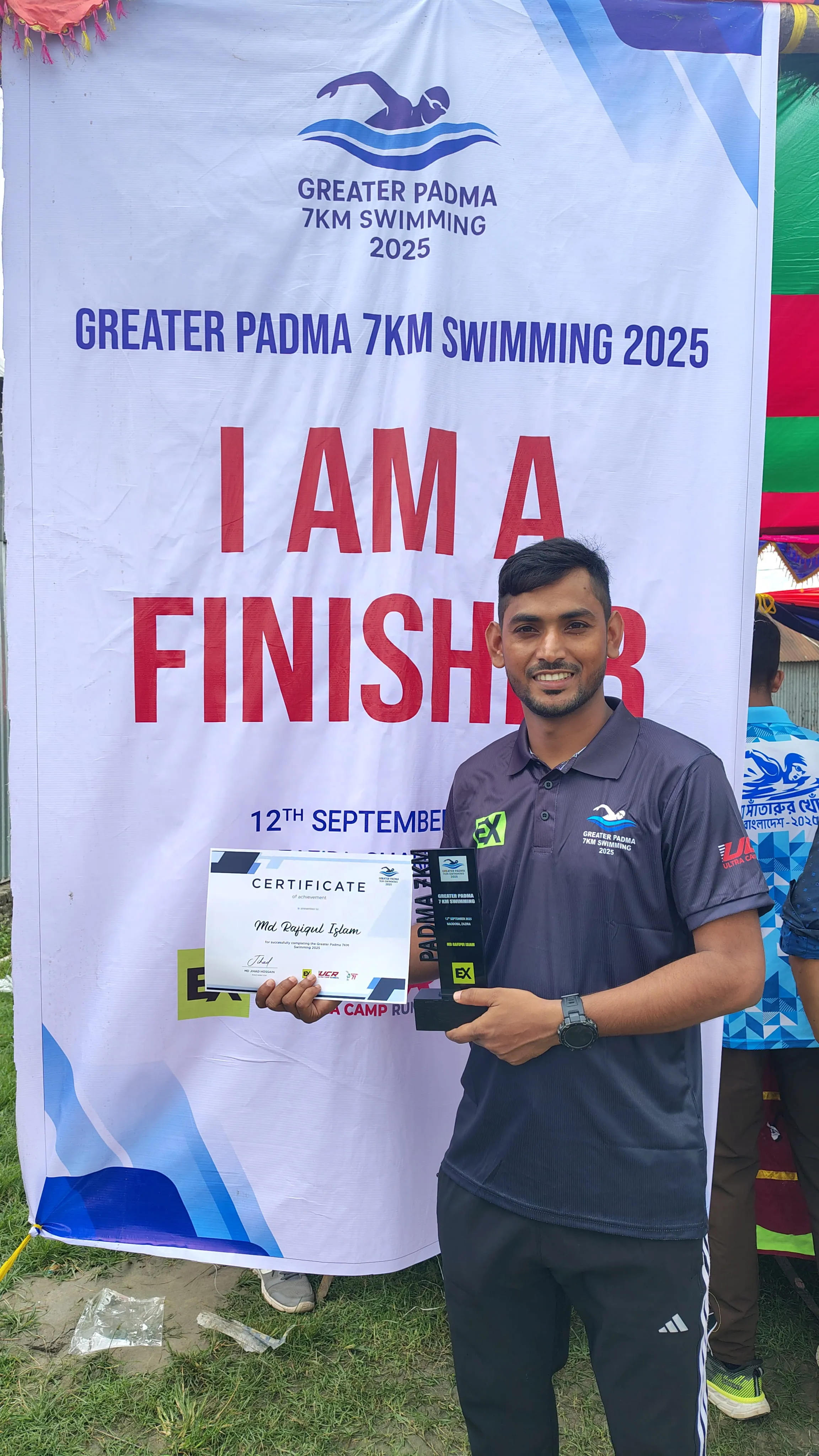 Male swimming coach by a pool